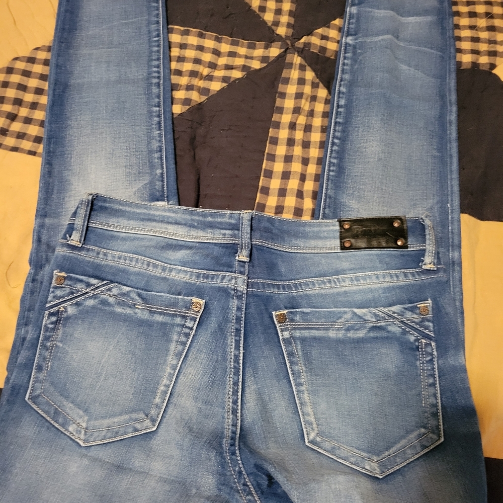 Womens Buckle Black Jeans size 27x31.